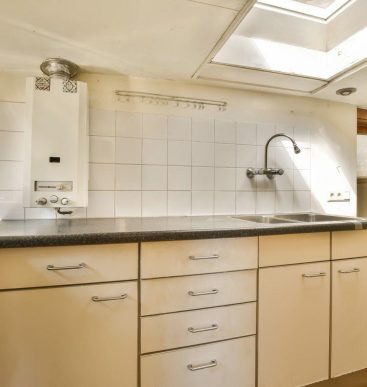 a-kitchen-with-white-cabinets-and-a-sink-2026-03-18-11-10-25-utc (1)